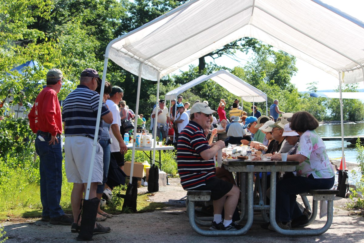 Happy Customers enjoy breakfast on Refugee Island