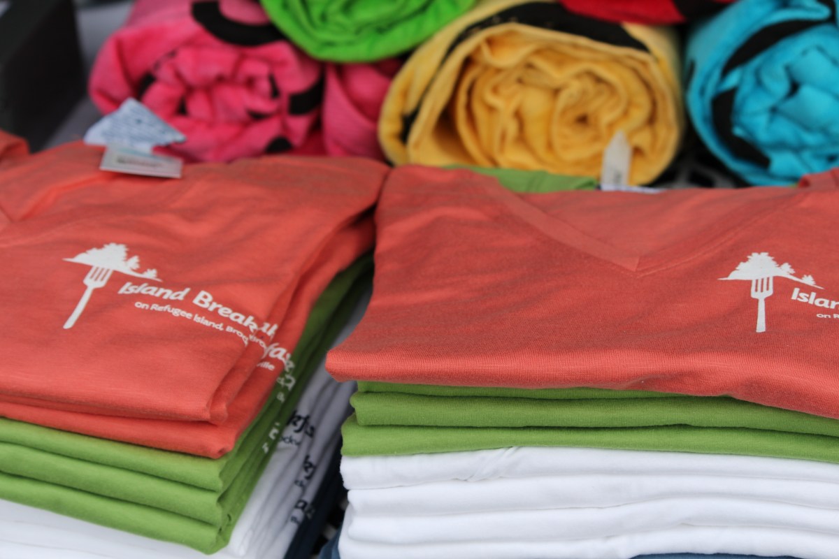 Event merchandise for the Refugee Island Breakfast